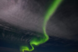 Single aurora serpentine streamer through cirrus clouds 12 dsc 0236