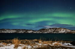 evolving aurora arc over bay and islands 6 dsc 1292