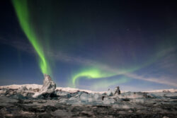 Several aurora streamers above 'Iceberg Lagoon' under a full moon #1 8 dsc 0547