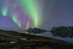 Mixed Aurora formations over Icelandic Fjord, Milky Way partially visible dsc 4457