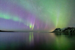 Mixed aurora formation over bay; Milky Way visible dsc 4484