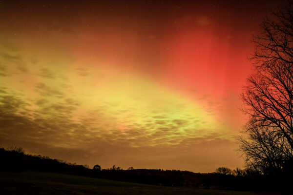 Red ribbons and green aurora mix to form yellow through the clouds during intense storm 1 dsc 0698